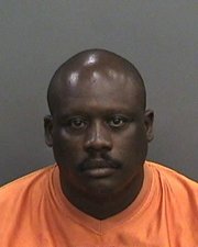 Panhandler Arrested On Gun And Drug Possession Charges