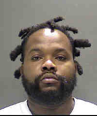 Man On House Arrest Charged with Firearm, Drug Possession