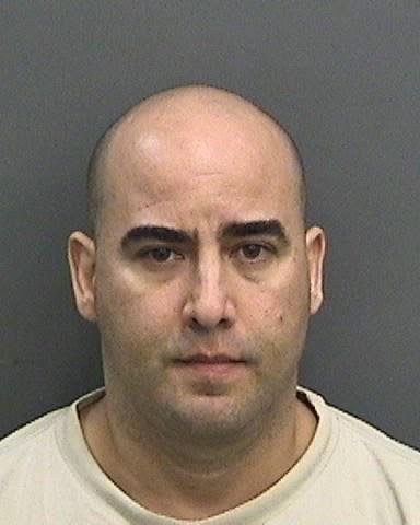 Teacher Who Spat On, Slammed Student On Desk Arrested