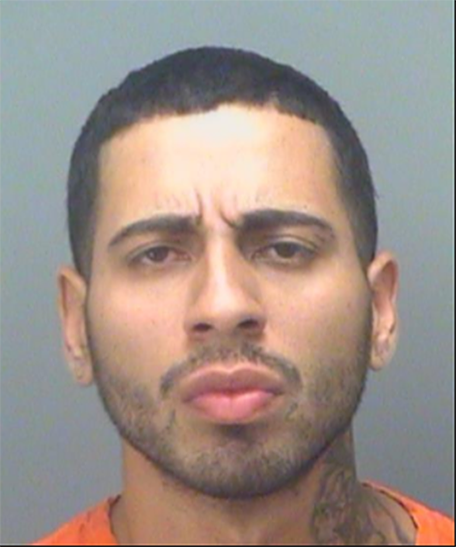 Man Charged With Murder Of Victim Found In Motel Parking Lot