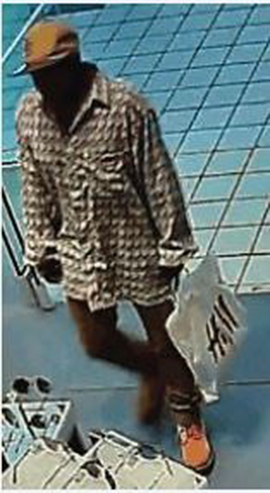 Four Sought In Theft Of $1,500 Sunglasses