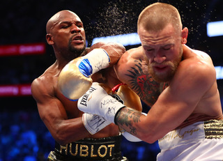 Mayweather, A Defensive Mastermind, Beats McGregor With His Fists, Ends His Career 50-0