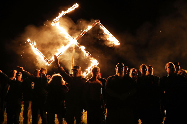 Small Group Of Neo-Nazis Burn 18-Foot Swatiskas After Georgia Rally