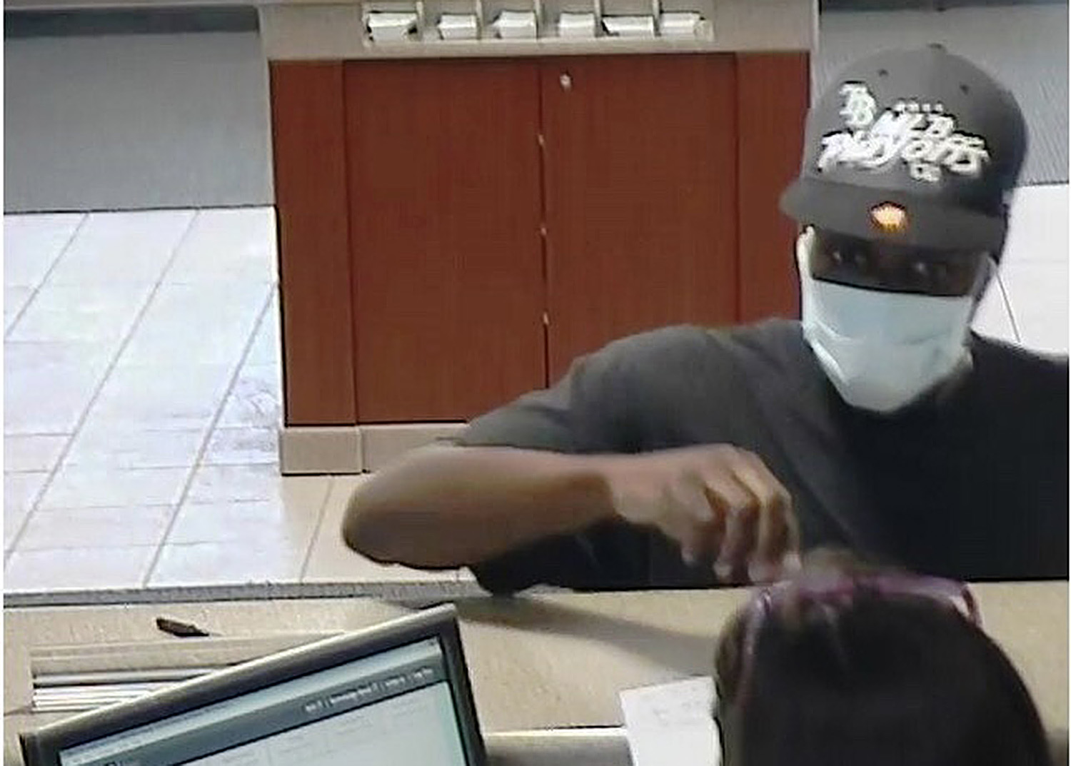 Police Search For Bank Robbery Suspect