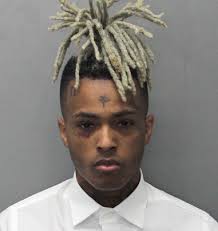 Fans Mourn Florida Rapper XXXTentacion’s Death With Vigil