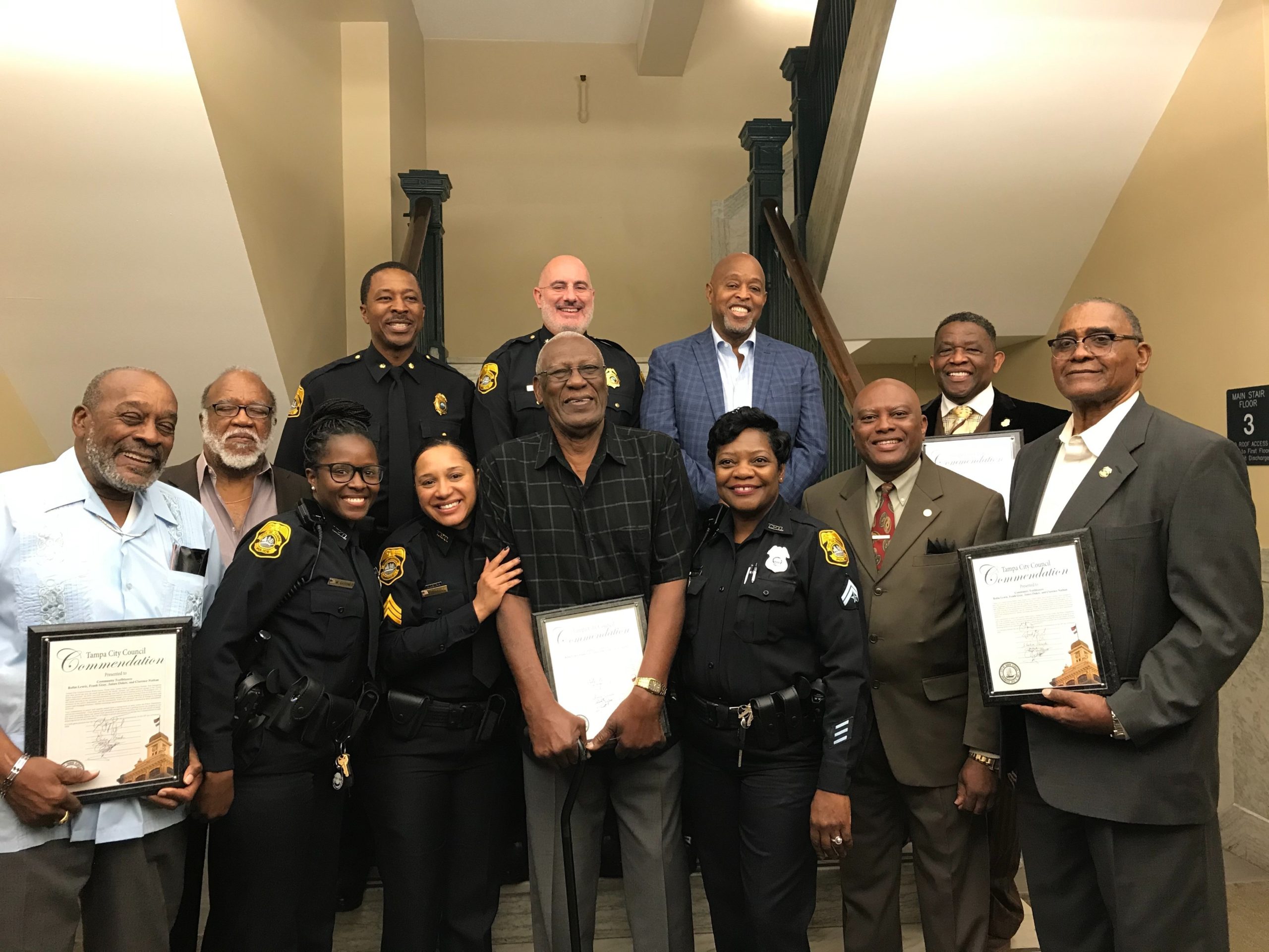 Front Page - Fab 4 with officers