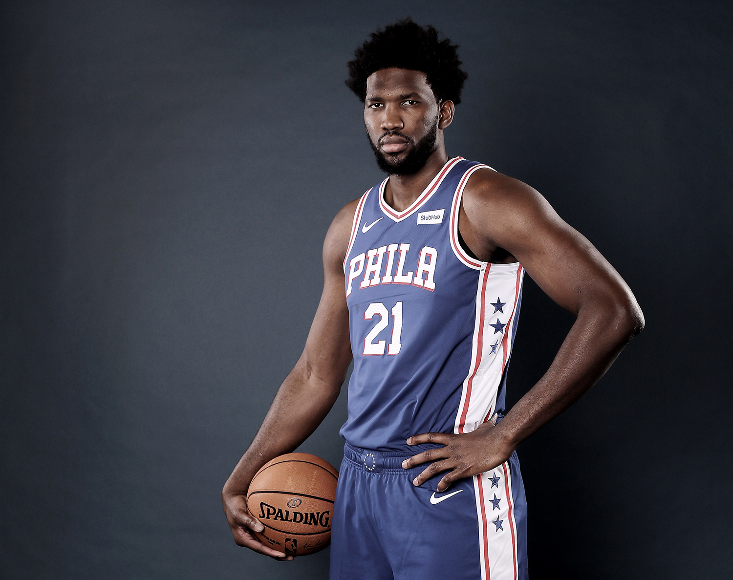 CAMDEN, NEW JERSEY - SEPTEMBER 30: (EDITORS NOTE: Image has been desaturated.) Joel Embiid #21 of the Philadelphia 76ers poses for a portrait during Media Day at 76ers Training Complex on September 30, 2019 in Camden, New Jersey.NOTE TO USER: User expressly acknowledges and agrees that, by downloading and/or using this photograph, user is consenting to the terms and conditions of the Getty Images License Agreement. (Photo by Elsa/Getty Images)