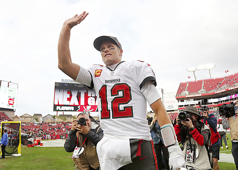 Jan 16, 2022; Tampa, Florida, USA; Tampa Bay Buccaneers quarterback Tom Brady (12) celebrates after they beat the Philadelphia Eagles in a NFC Wild Card playoff football game at Raymond James Stadium. Mandatory Credit: Kim Klement-USA TODAY Sports