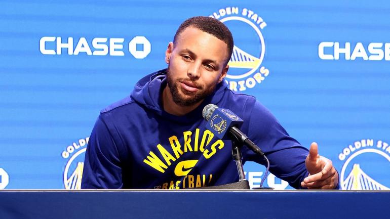 SAN FRANCISCO, CALIFORNIA - MARCH 20: Stephen Curry #30 of the Golden State Warriors speaks to the media during a press conference prior to the start of the game against the San Antonio Spurs at Chase Center on March 20, 2022 in San Francisco, California. NOTE TO USER: User expressly acknowledges and agrees that, by downloading and or using this photograph, User is consenting to the terms and conditions of the Getty Images License Agreement. (Photo by Jed Jacobsohn-Pool/Getty Images)