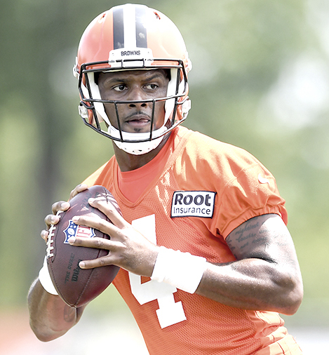 Cleveland Browns quarterback Deshaun Watson takes part in drills during the NFL football team's training camp, Monday, Aug. 1, 2022, in Berea, Ohio. (AP Photo/Nick Cammett)