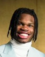 Travis Hunter Vehemently Defends Fiancée Crying Herself To Sleep From Online Hate