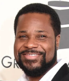 Malcolm-Jamal Warner’s Widow Tenisha Sues His Mom for $1.2 Million One Year After His Death